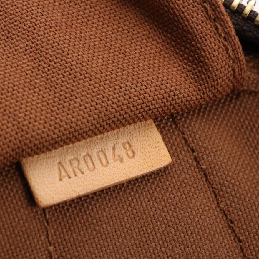 Louis Vuitton Montorgueil PM Bag in Monogram Canvas and Vachetta Leather